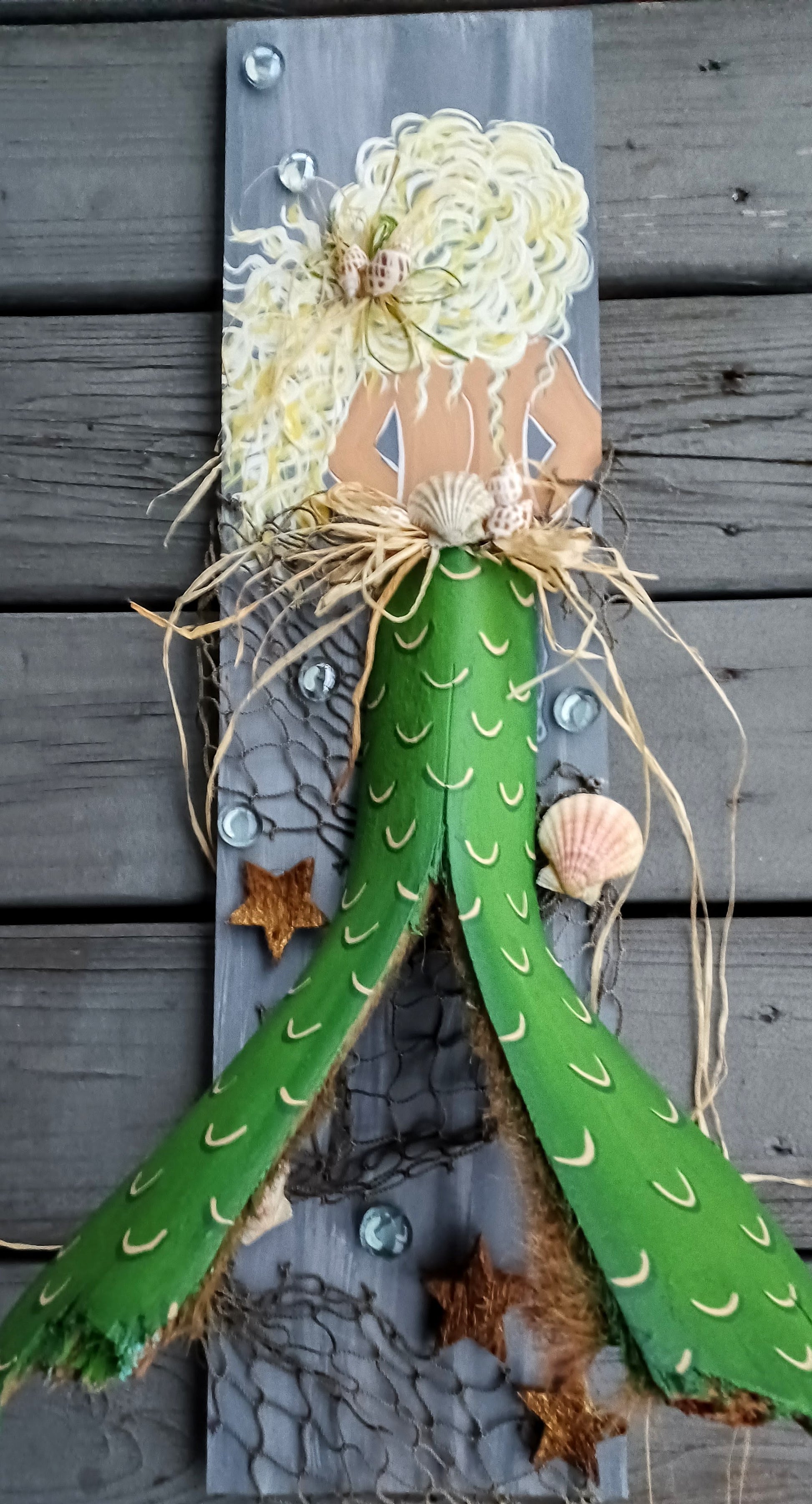 Mermaid painting with green palm frond tail on recycled wood 