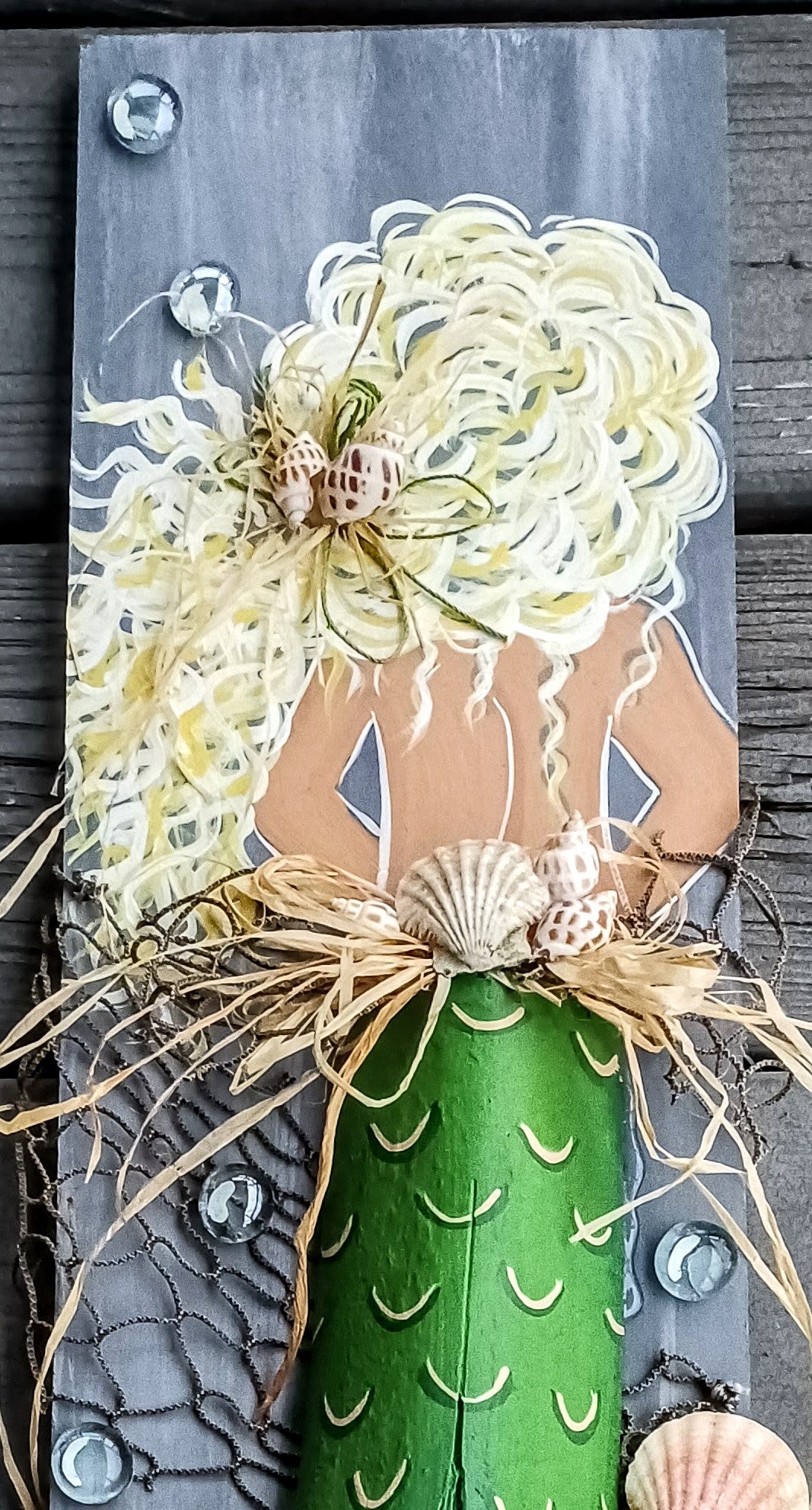 Mermaid painting with palm frond tail on recycled wood 