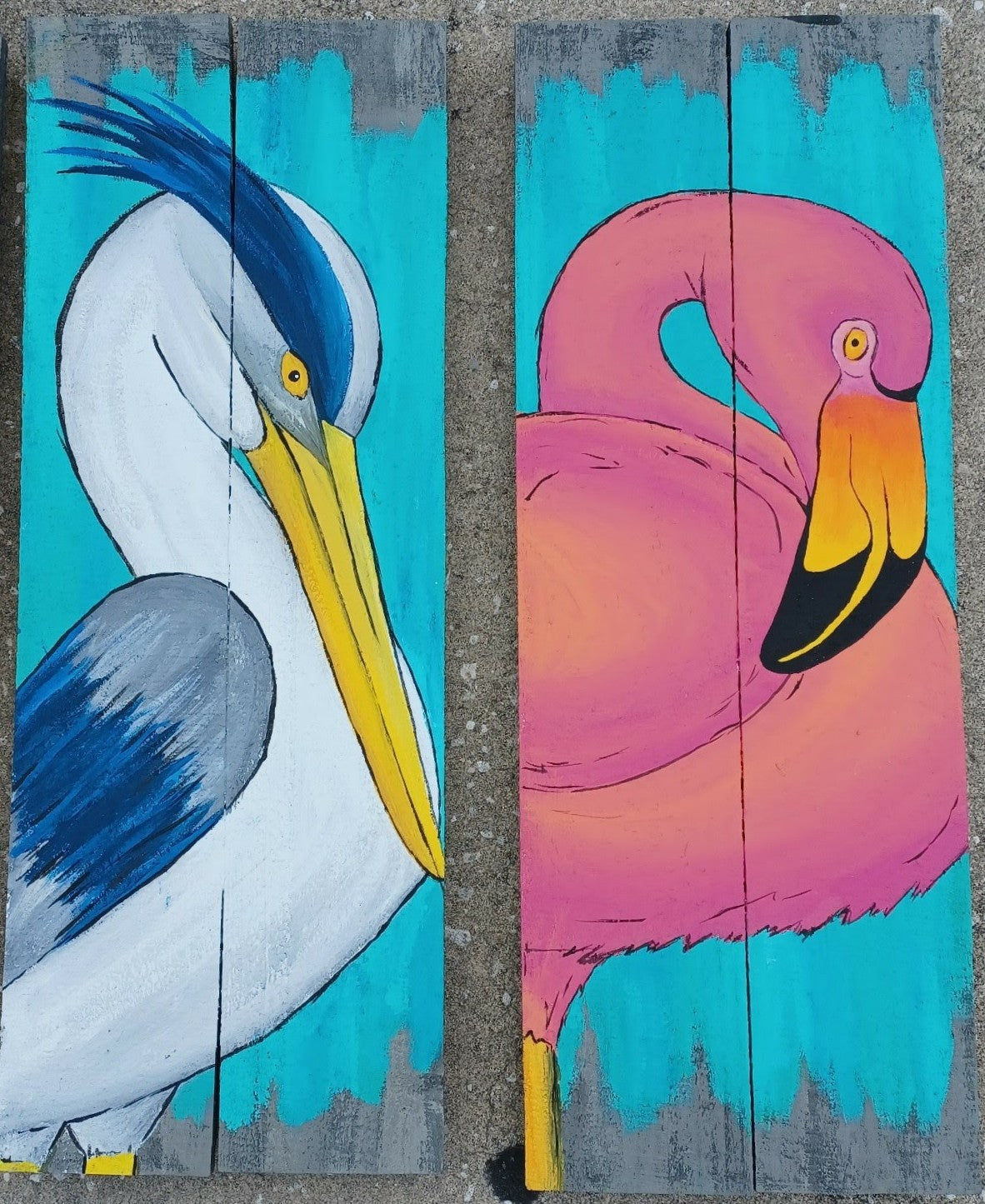 Blue heron and flamingo painted on gray double wood boards with aqua background 