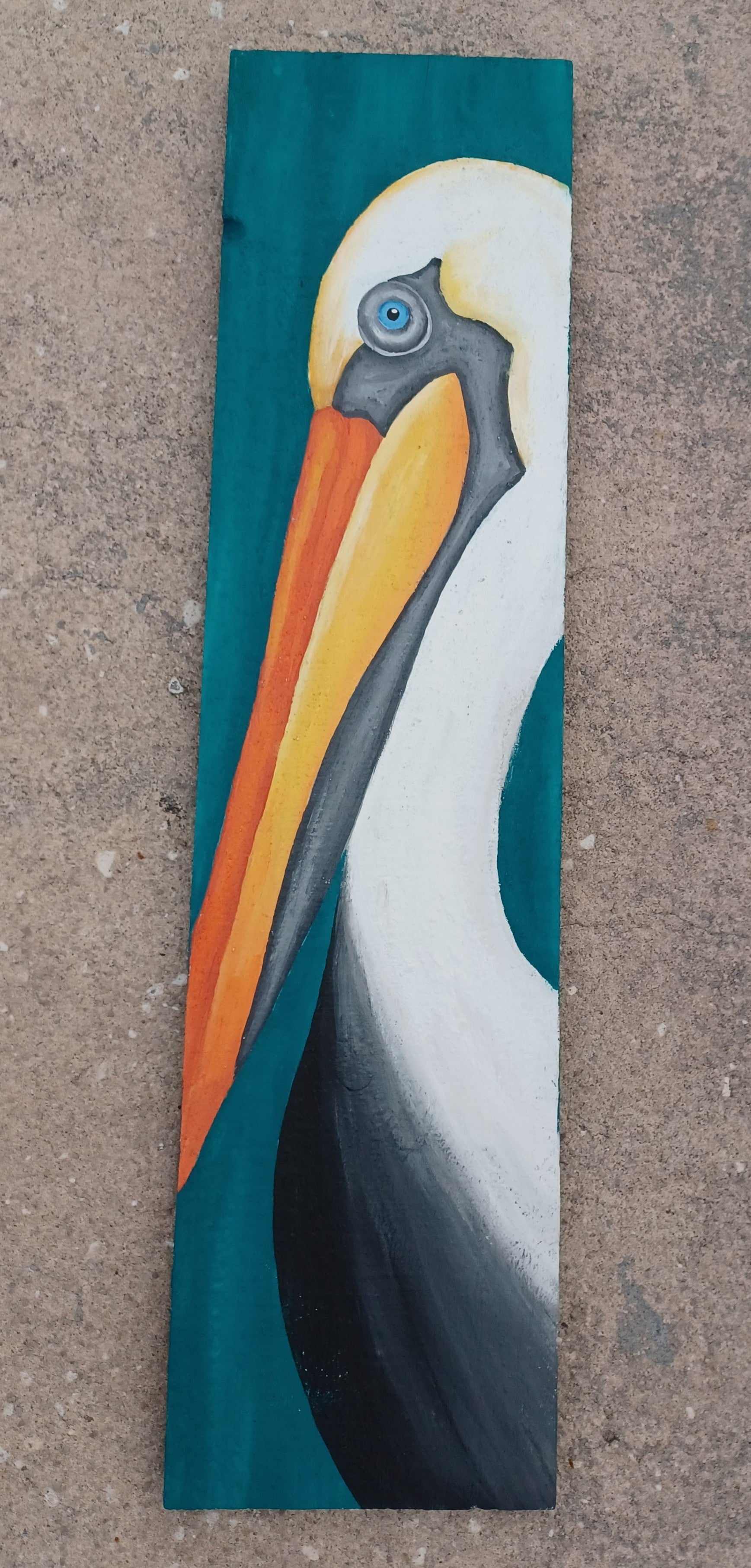 Pelican painting on teal reclaimed wood boards