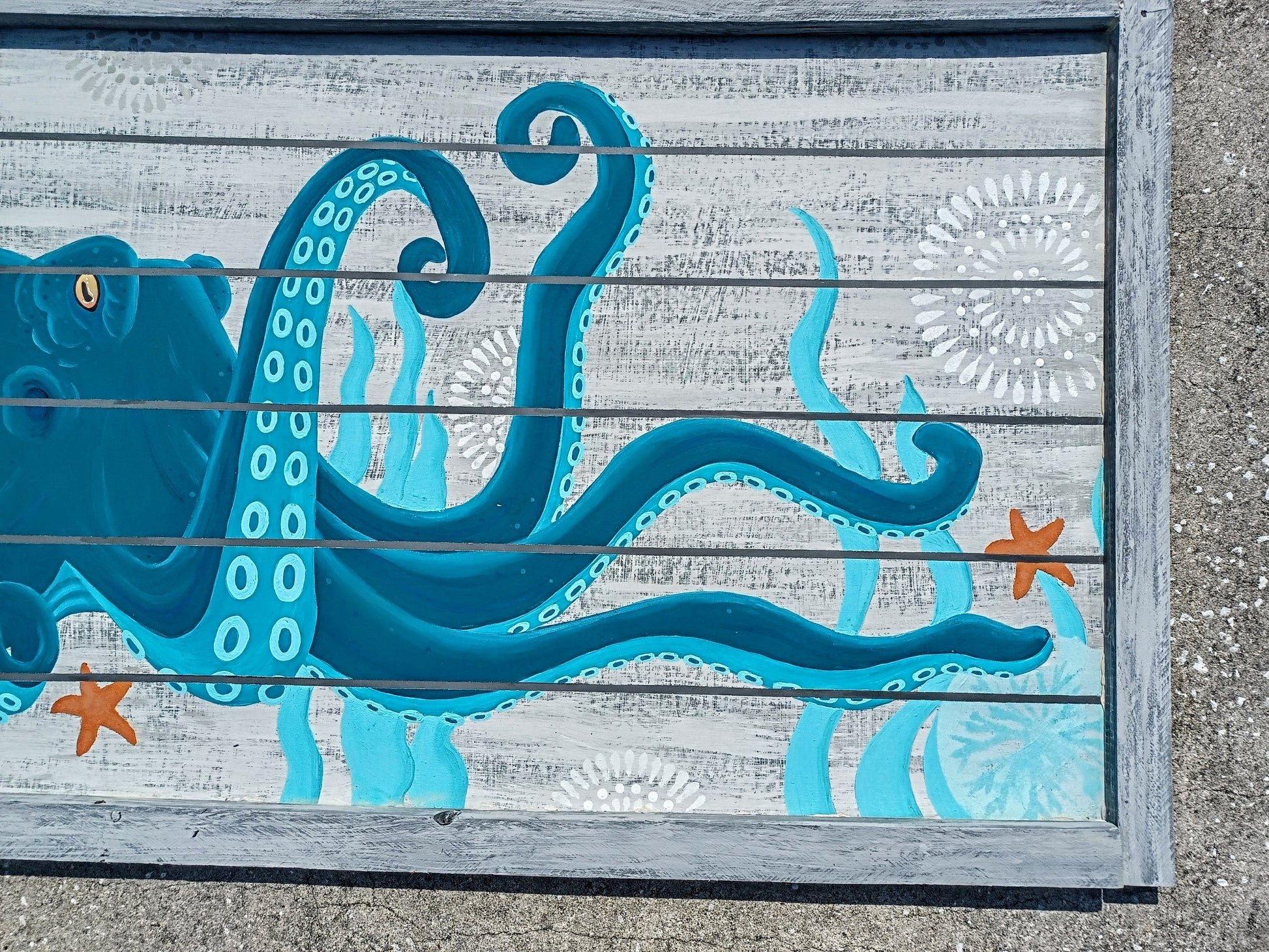 Teal and Aqua Octopus painting on gray wood