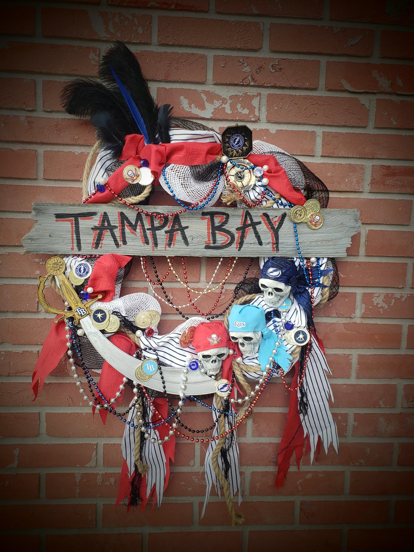 Champa Bay Pirate wreath, Gasparilla wreath with skulls supporting Tampa teams Bucs Bolts Rays 