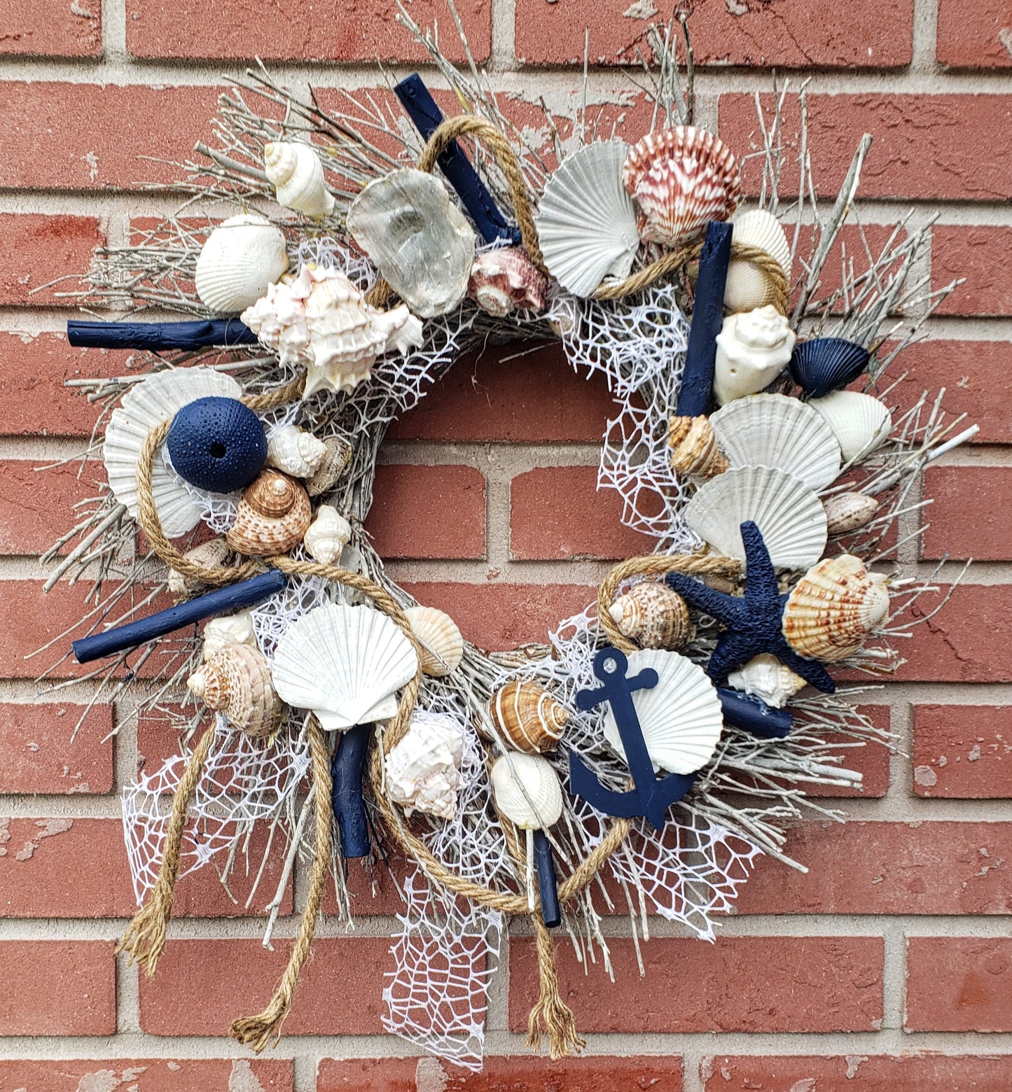 Beach themed wreath shells, statfish, nautical rope and more