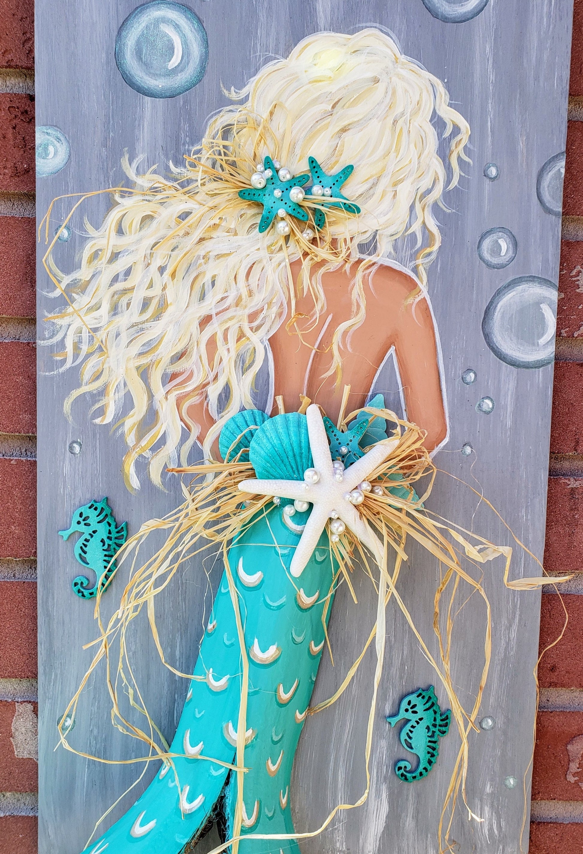 Aqua Mermaid painting with palm frond tail on recycled wood 