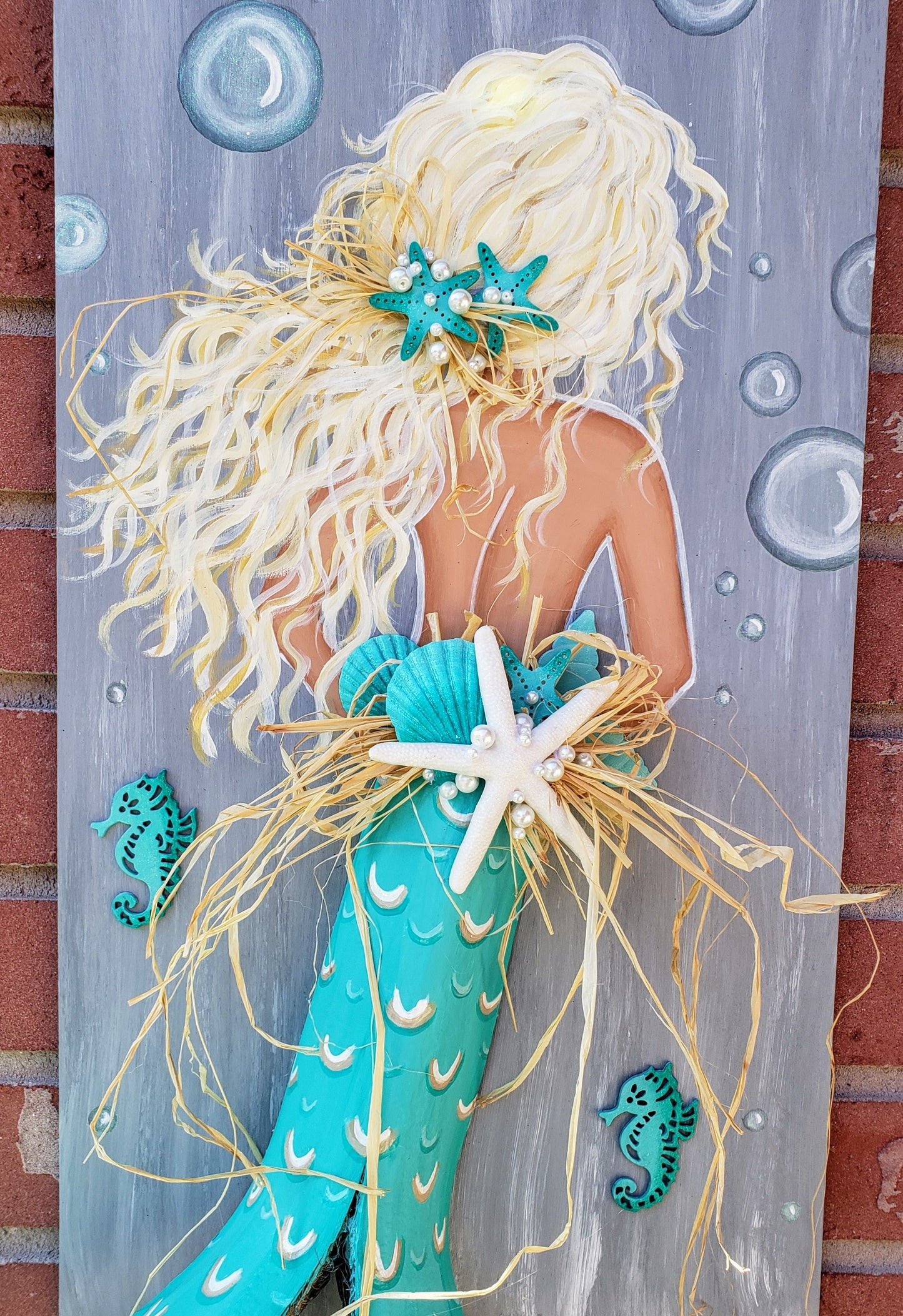 Mermaid painting on wood with palm frond tail