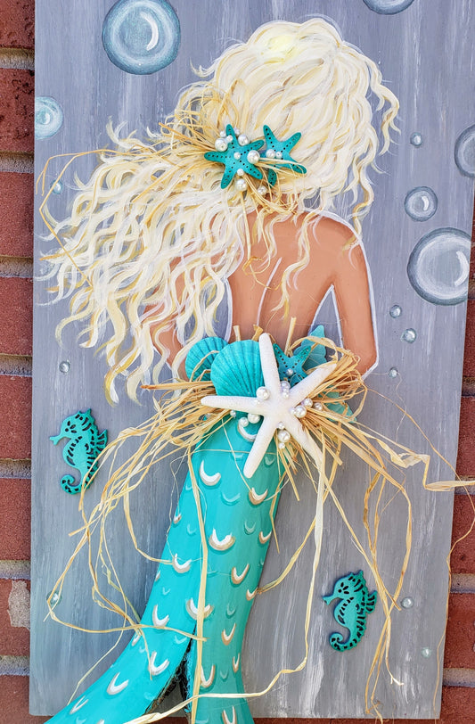 Aqua mermaid painting with palm frond tail on recycled wood 