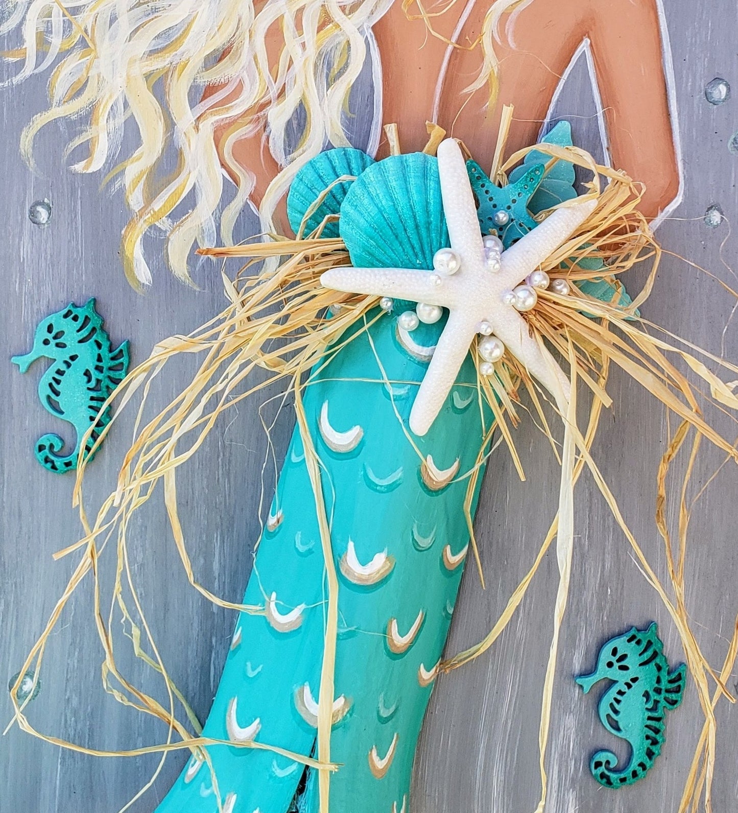 Aqua mermaid painting with palm frond tail on recycled wood 