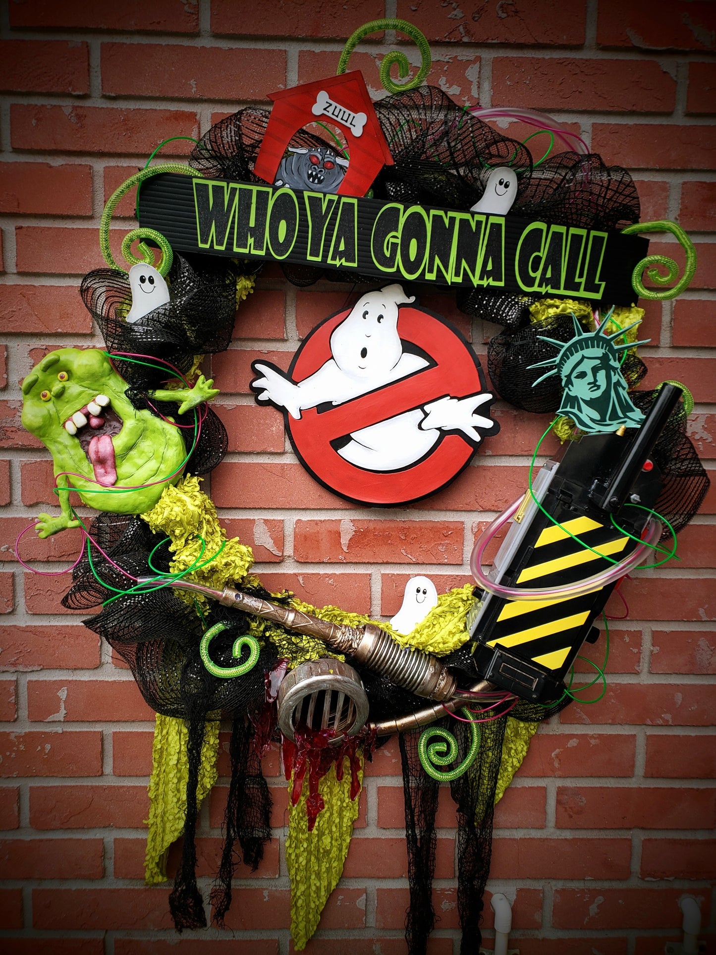 Ghostbusters wreath with Slimer, proton wand, ghost trap, drain with ectoplasm, zuul and more