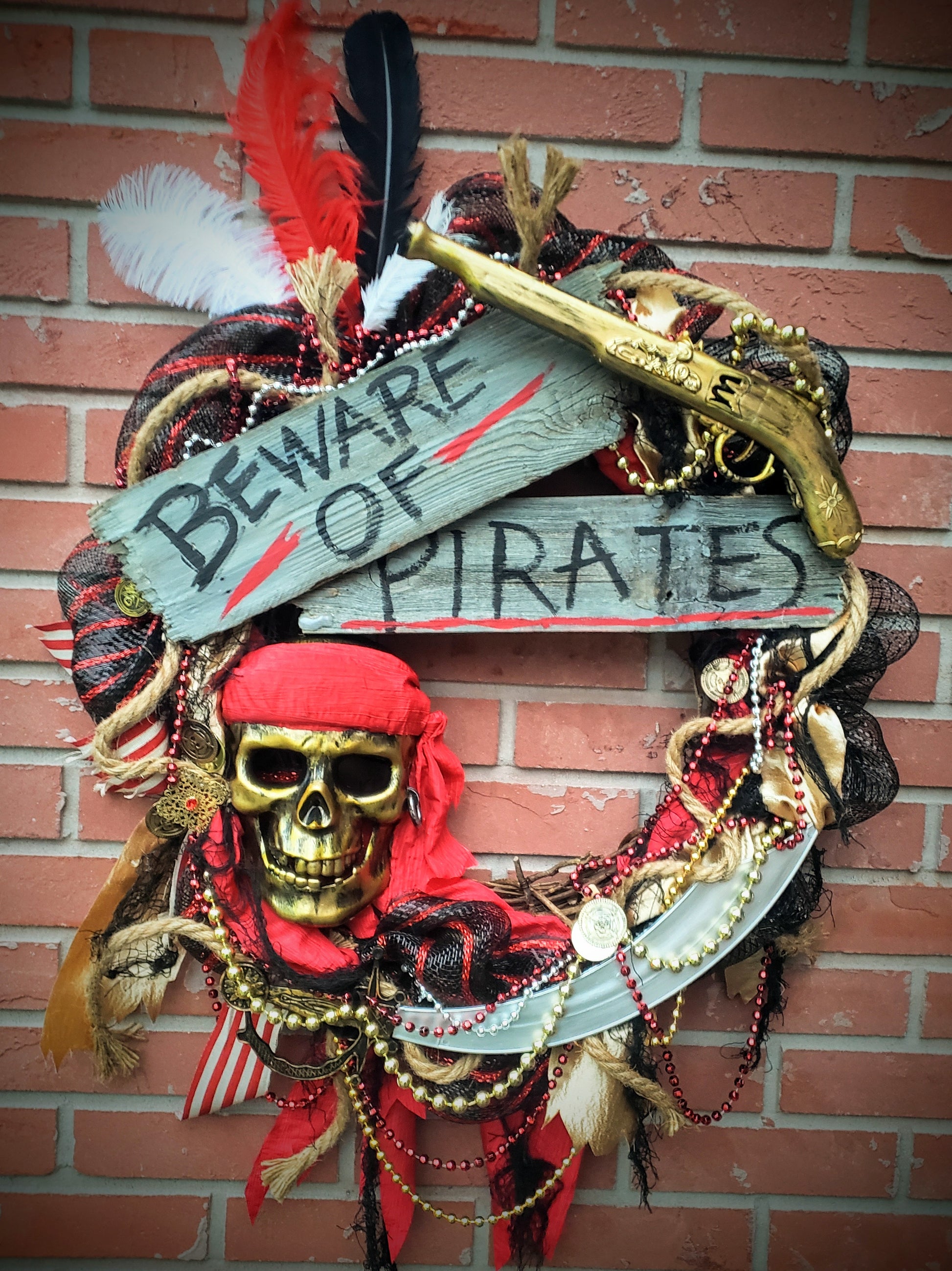 Beware of Pirates Gasparilla wreath red, black and gold 