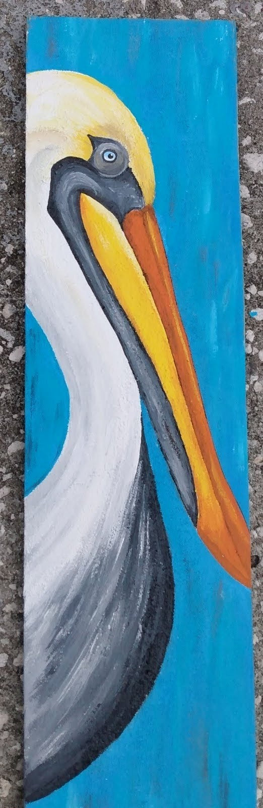 Pelican painting on a single turquoise blue board