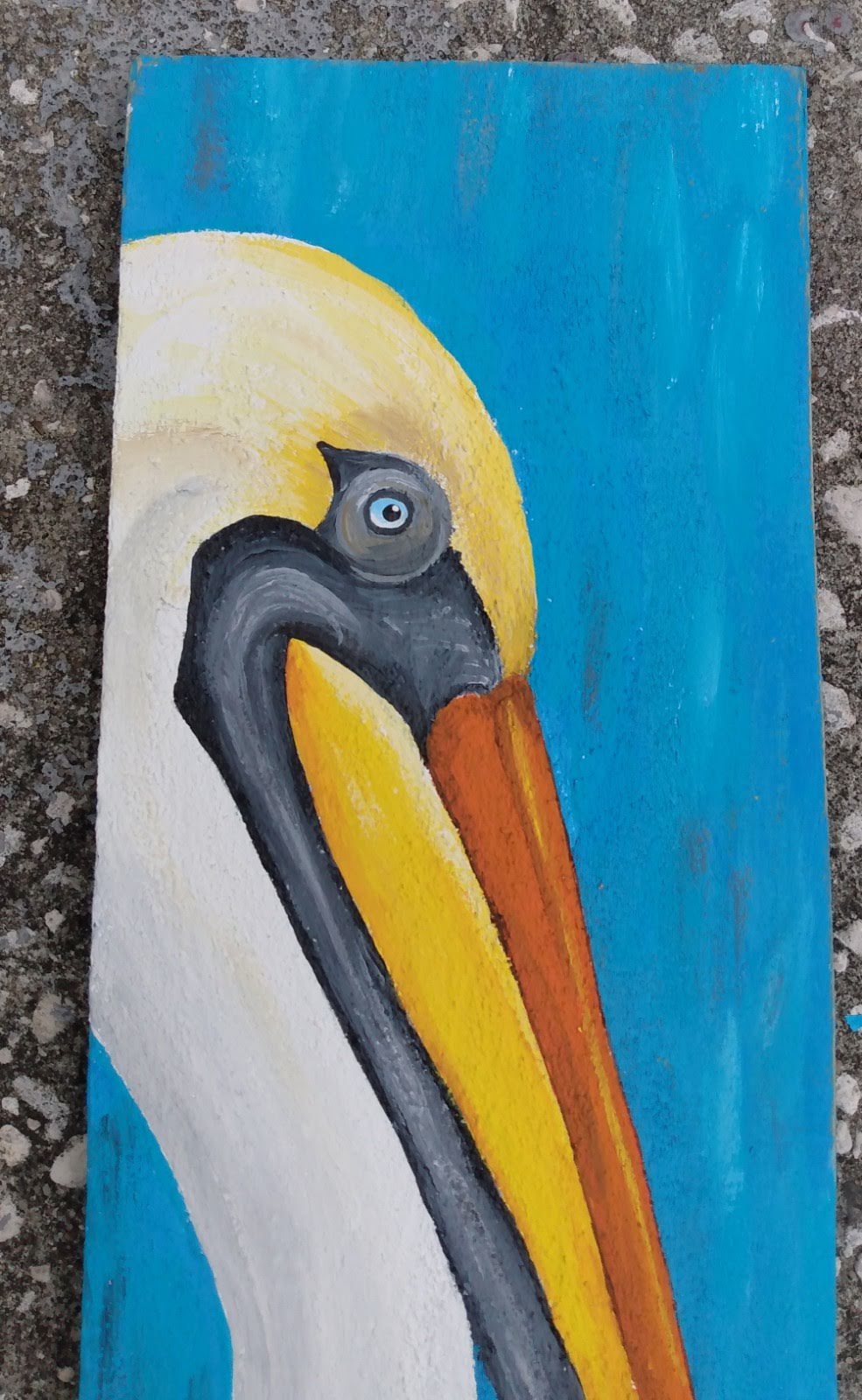 Pelican painting on a single turquoise blue wood board