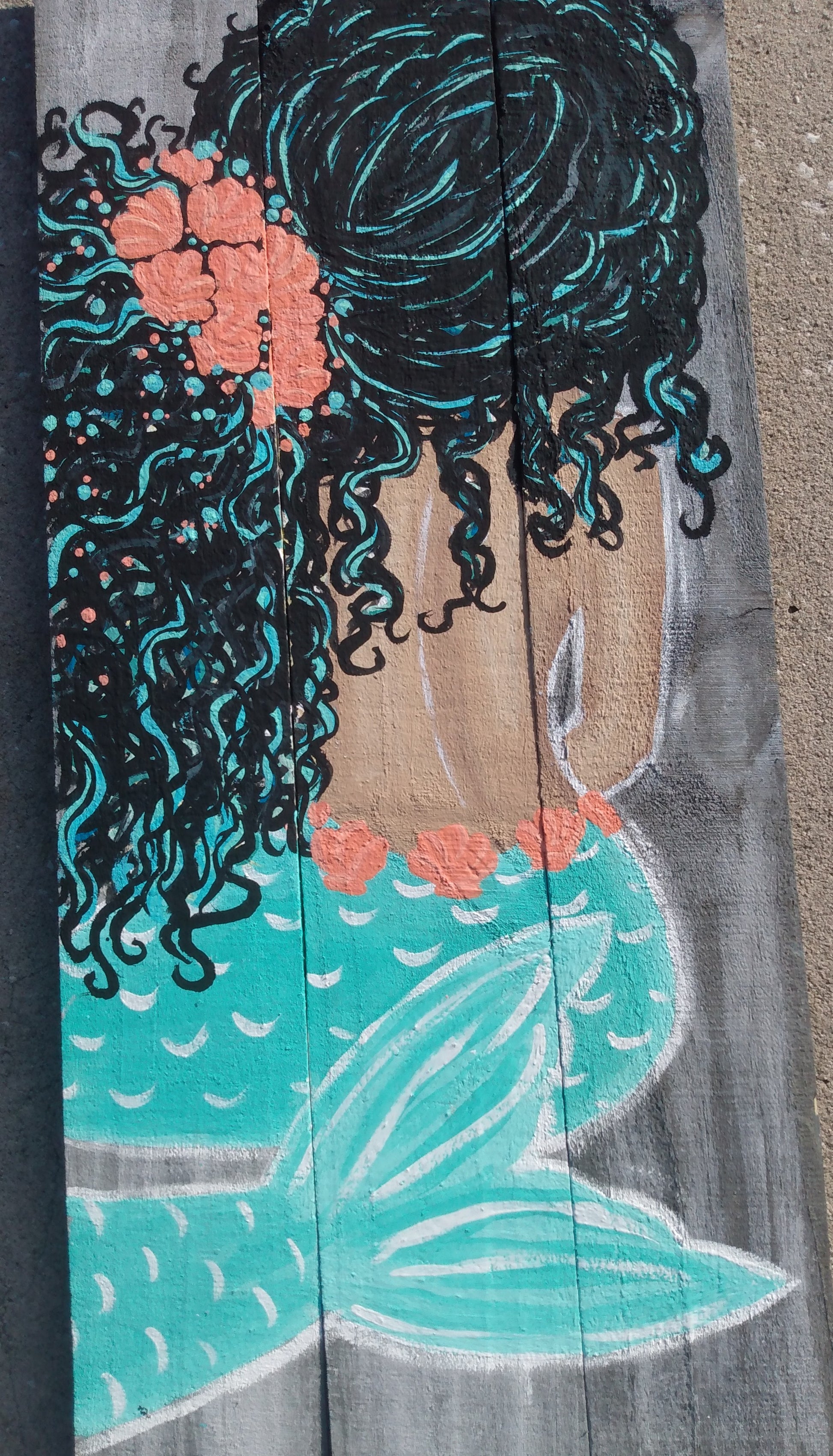 Hispanic mermaid painting on wood boards 