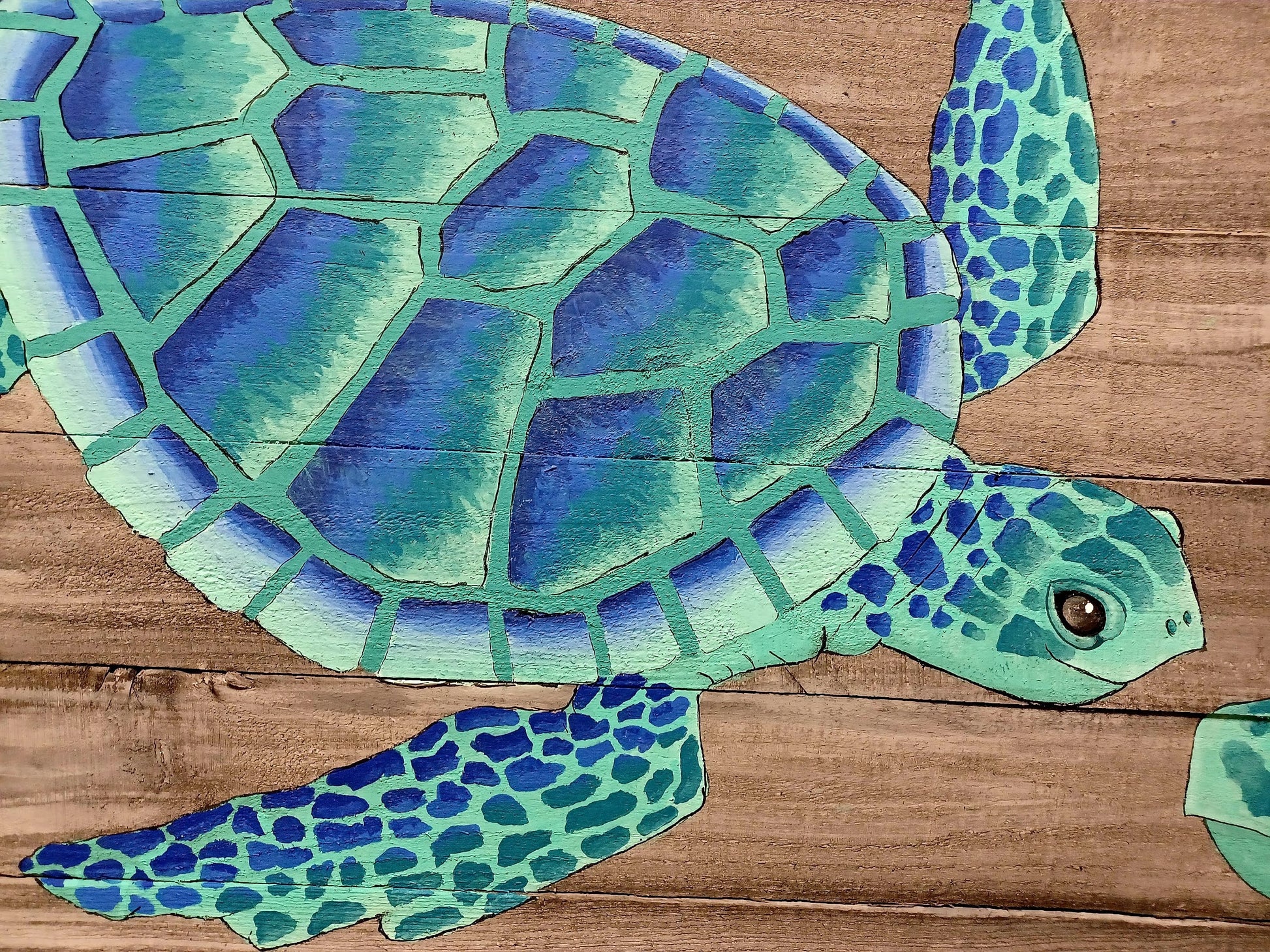 aqua and blue sea turtles painting on wood