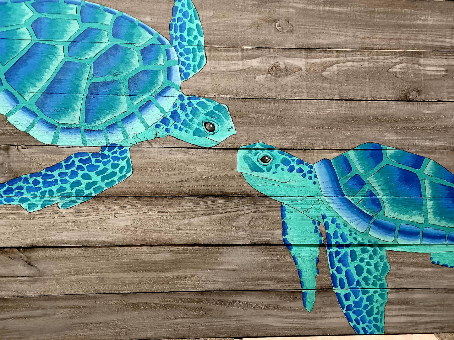 aqua and blue sea turtles painting on wood