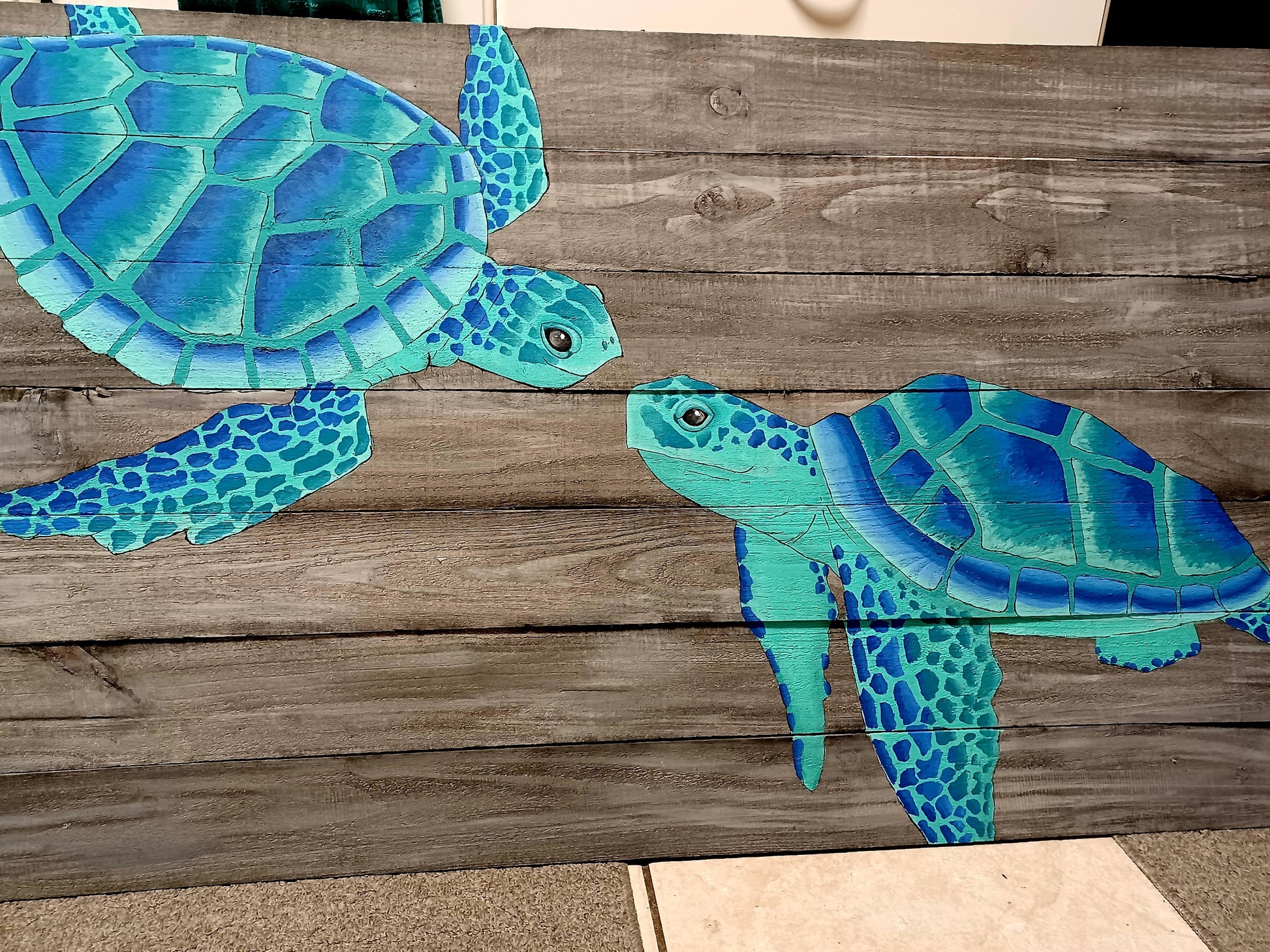 aqua and blue sea turtles painting on wood