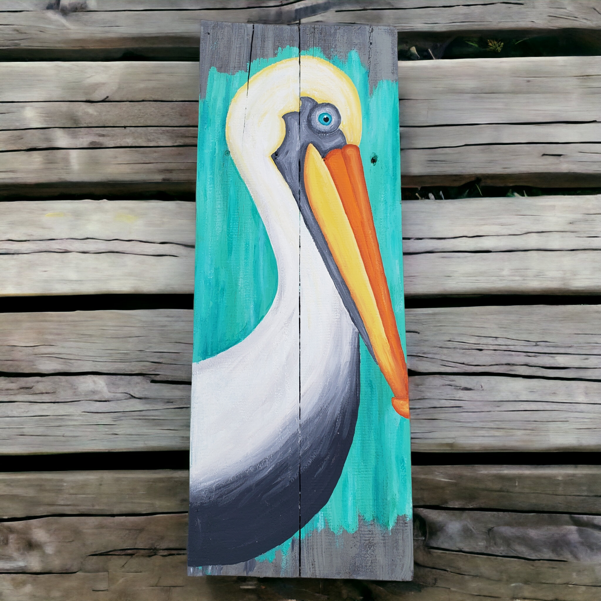 Pelican Painting facing right on gray reclaimed wood with aqua accents 