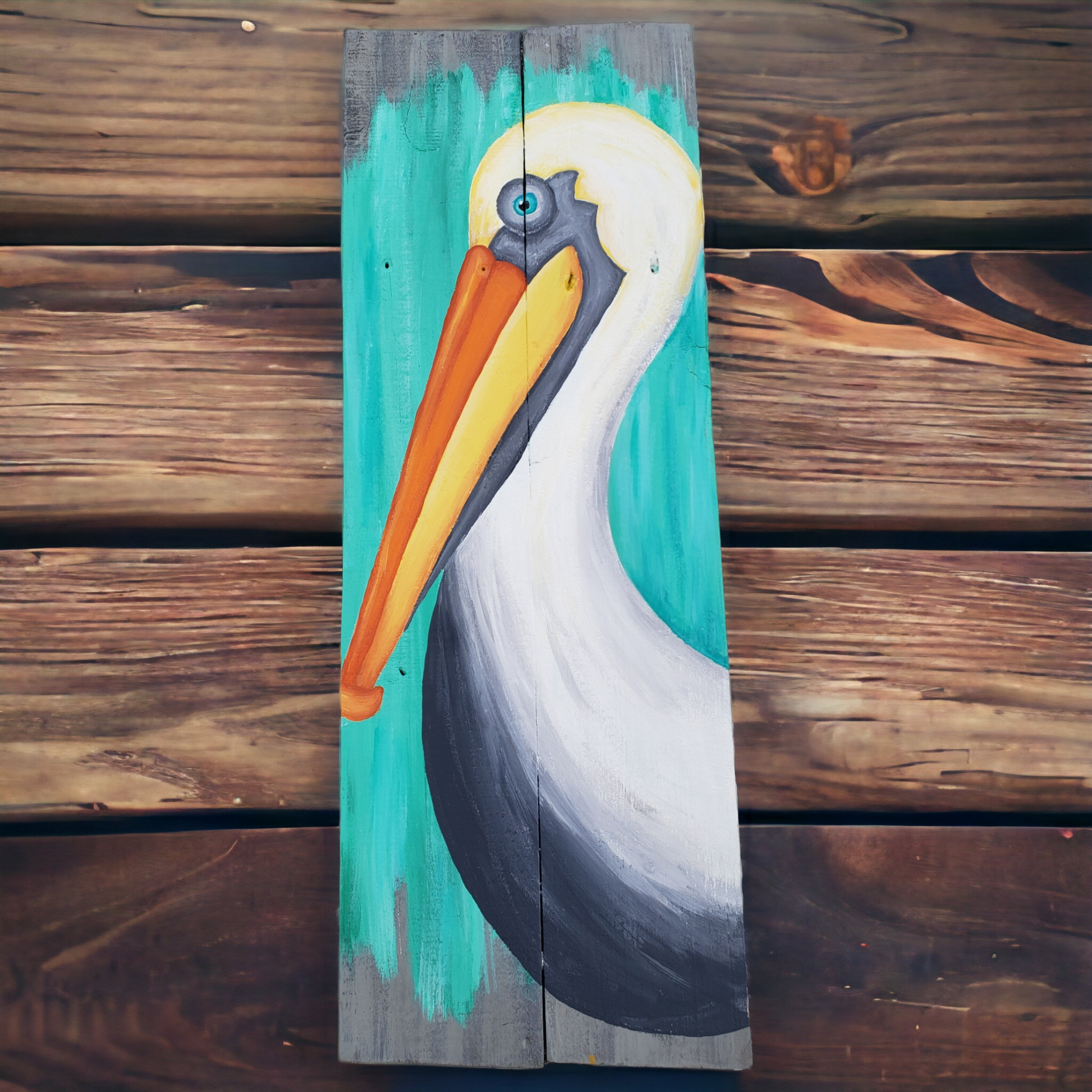 Pelican Painting facing left on gray reclaimed wood with aqua accents 