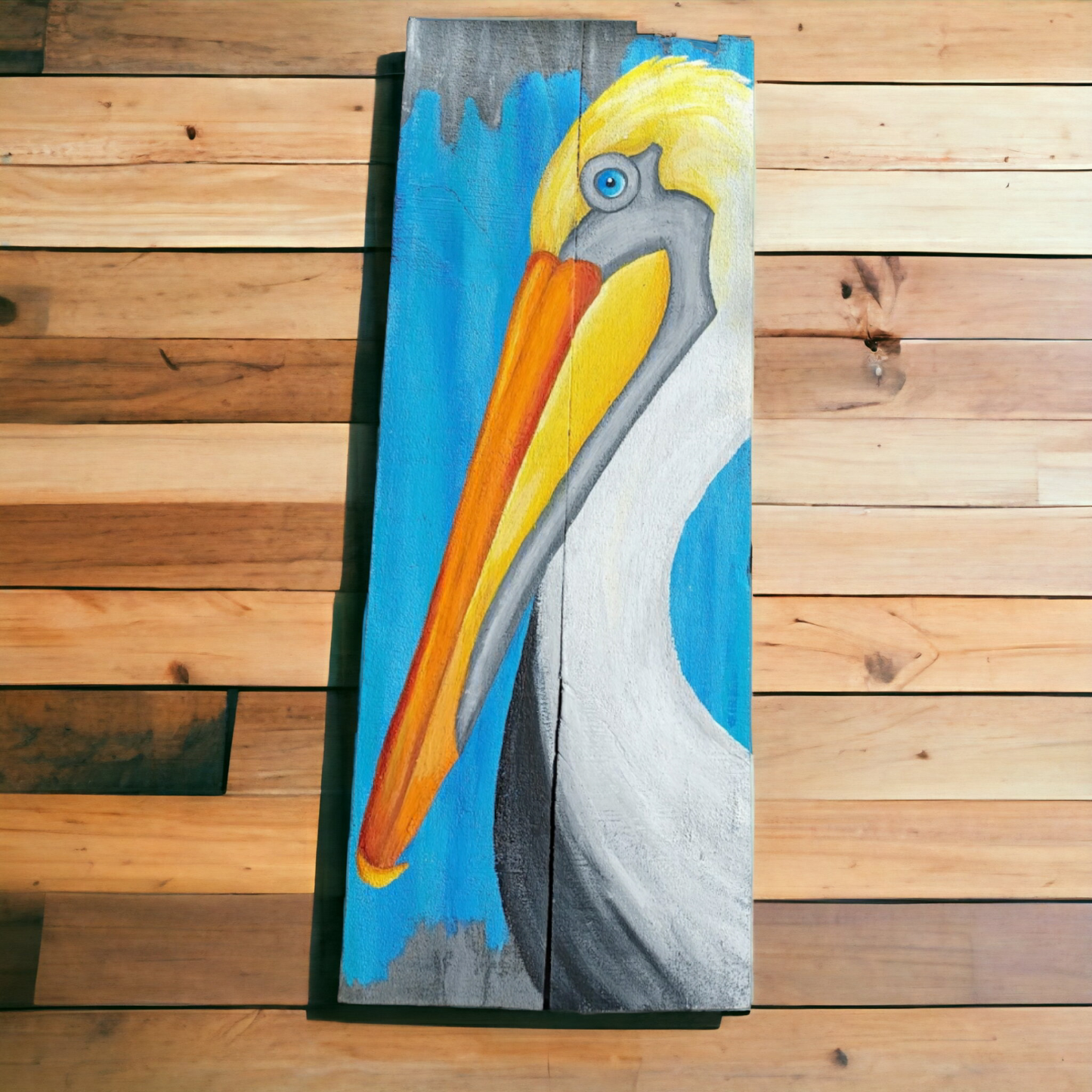 Pelicans hand painted on gray wood boards with a turquoise blue background accent color 