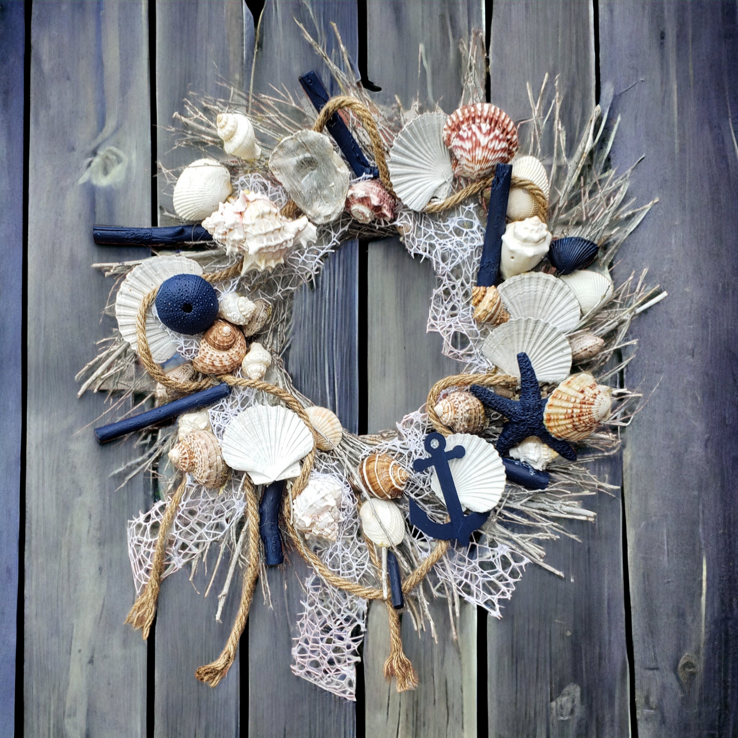 Beach themed wreath shells, statfish, nautical rope and more