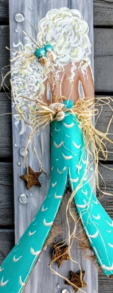 Mermaid painting with palm frond tail on recycled wood 