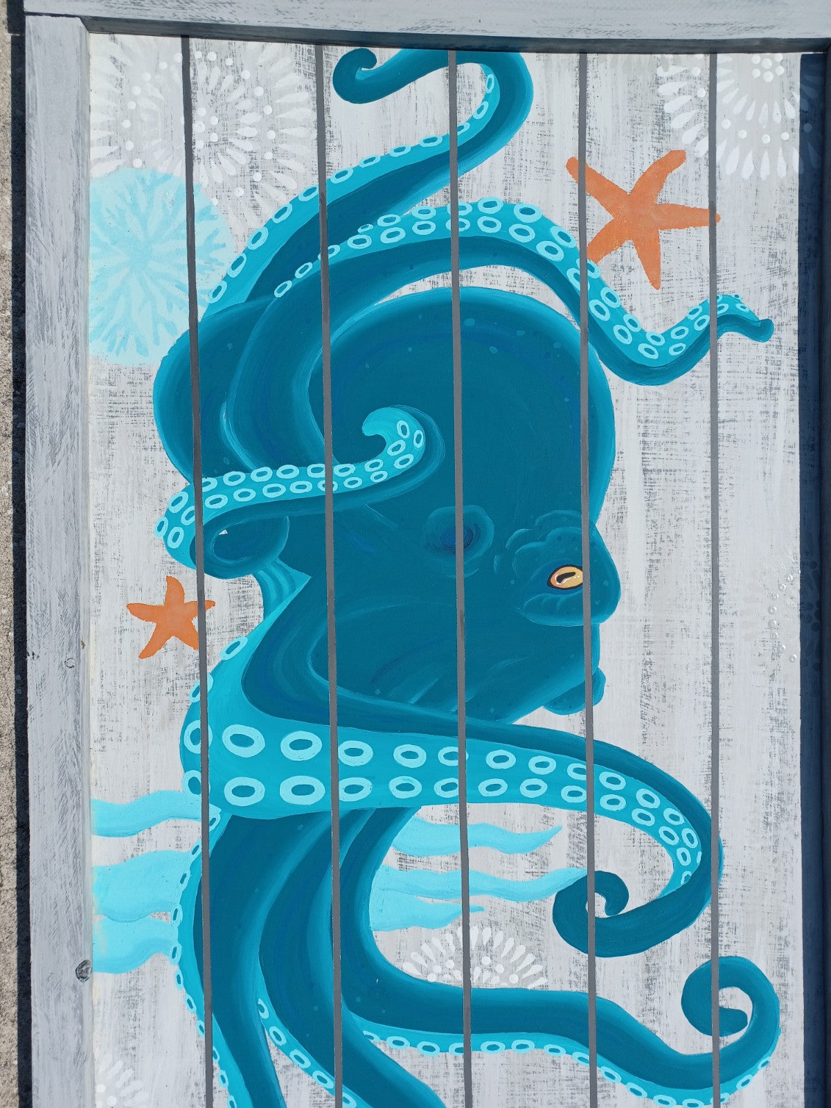 Teal and Aqua Octopus painting on gray wood