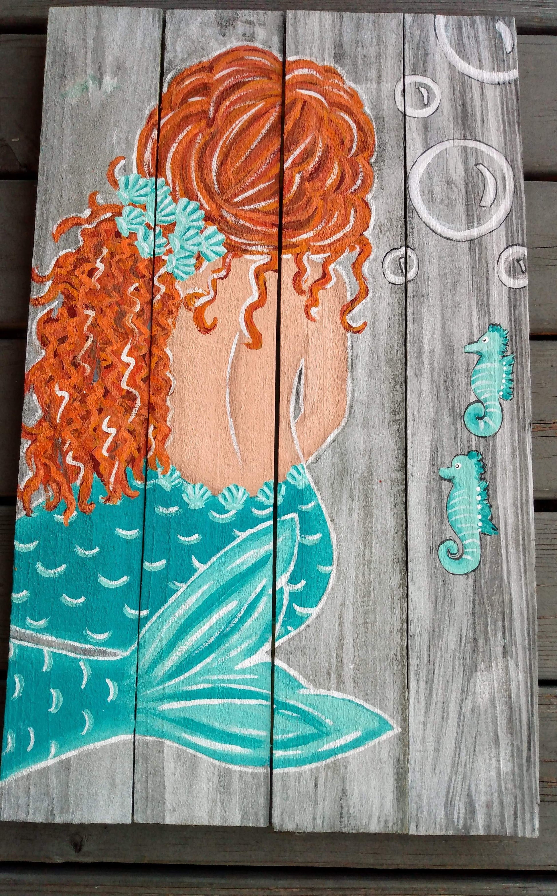 Custom mermaid on wood boards. Red hair